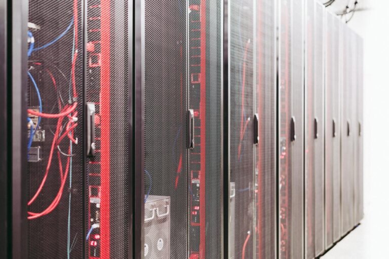 AI & Tech Week in Review: March 25, 2026 — Top Stories Modern data server room with network racks and cables.