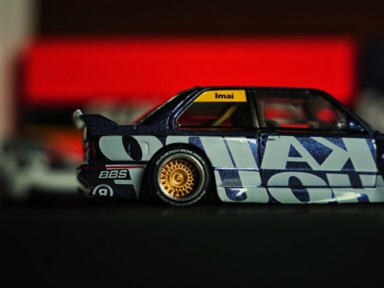 RTX 40-Series GPUs Flood Walmart: Steep Discounts Await A dark blue toy car with gold rims and graphics.