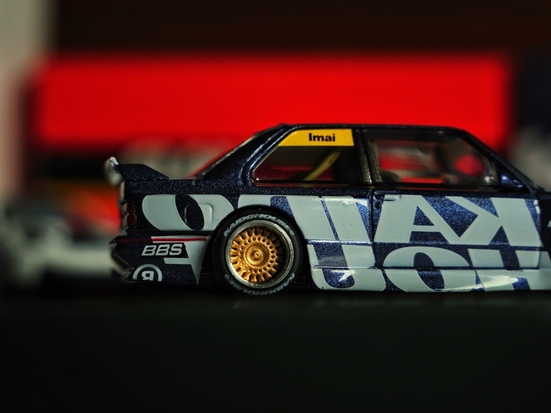 RTX 40-Series GPUs Flood Walmart: Steep Discounts Await A dark blue toy car with gold rims and graphics.